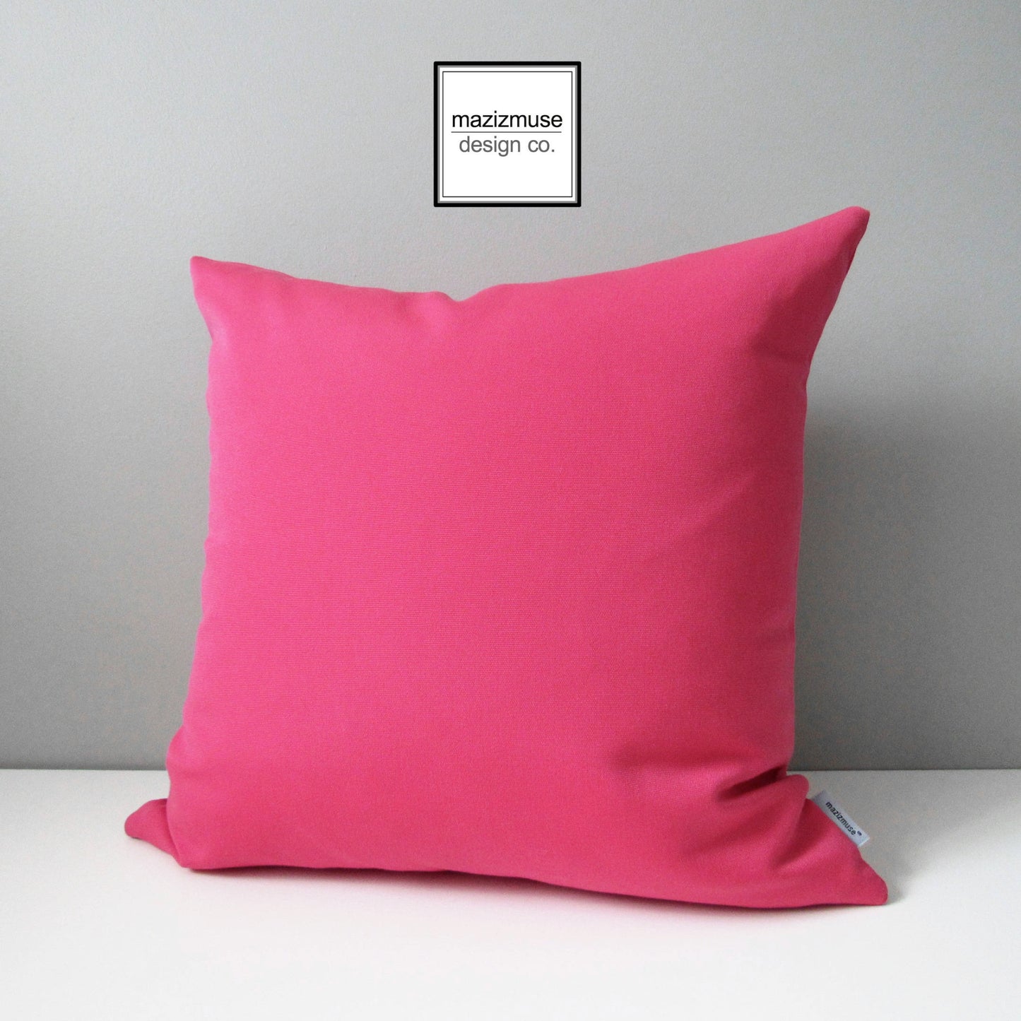 hot pink sunbrella outdoor pillow fro patio and garden decor