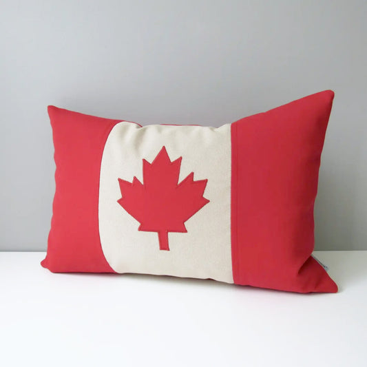 canada flag Pillow with a red and white maple leaf on a gray background