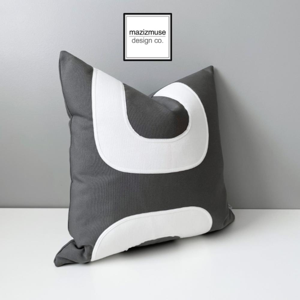 mid century modern outdoor pillow in grey with white retro design. 