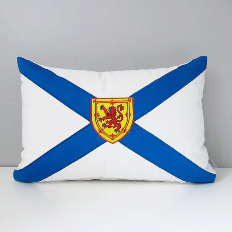 nova scotia flag Pillow with a blue and white cross design featuring a red coat of arms on a gray background